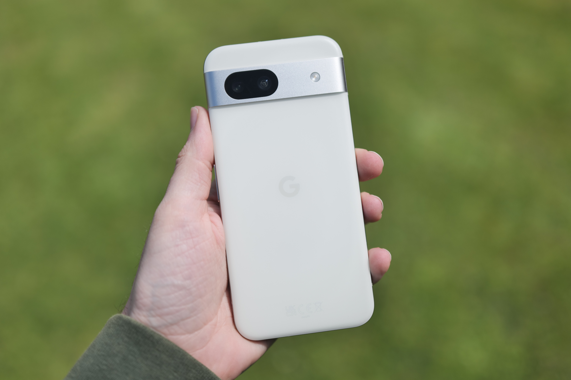 Google Pixel 8a review image showing phone back in hand