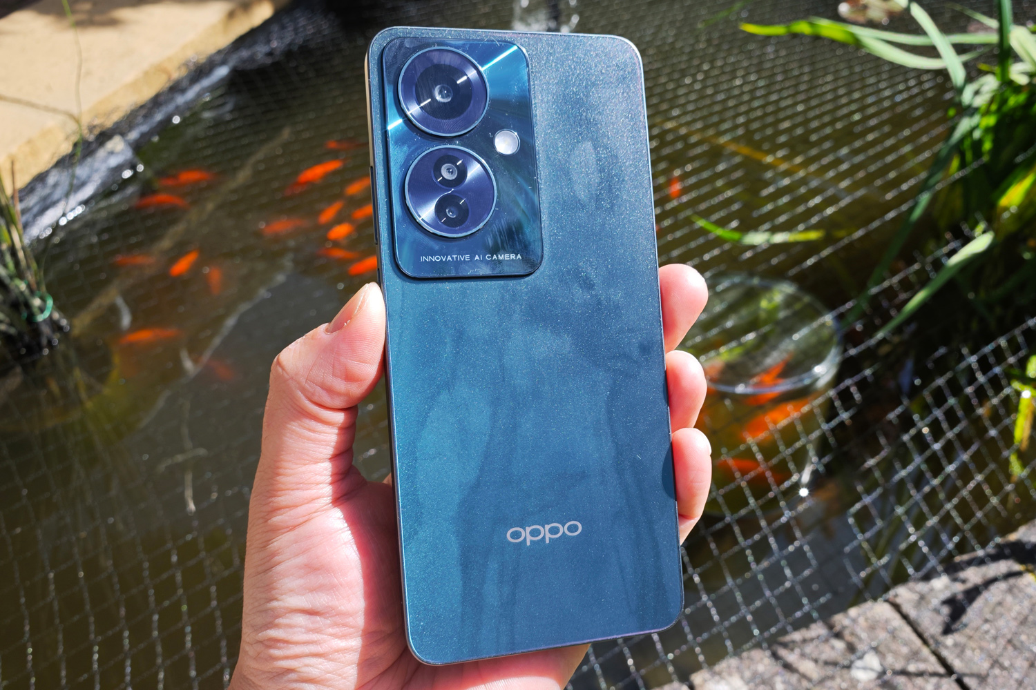 Oppo Reno 11 F review in hand rear