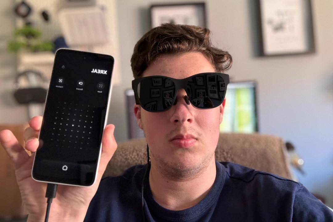 Xreal Beam Pro next to AR glasses