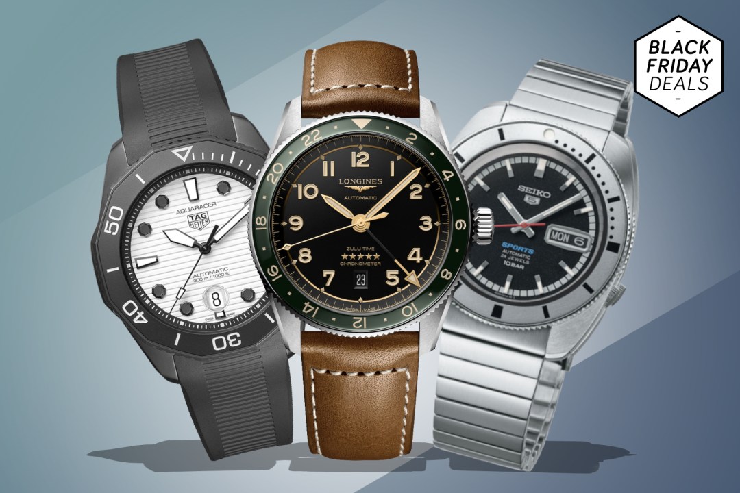 Three luxury watches on a grey and blue background