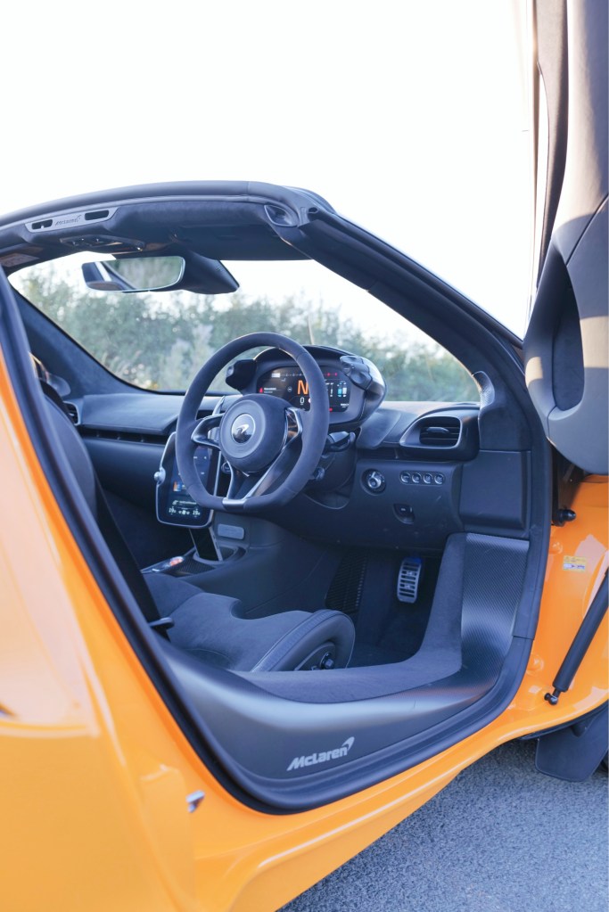 McLaren Artura on road doors open