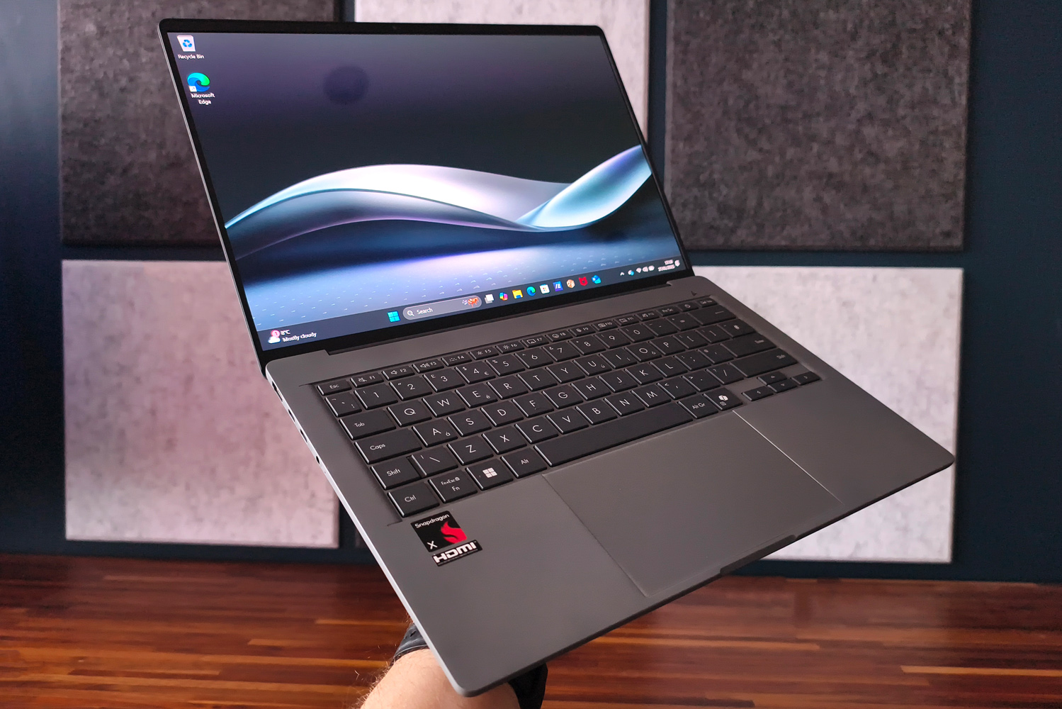 Asus ZenBook A14 review in hand